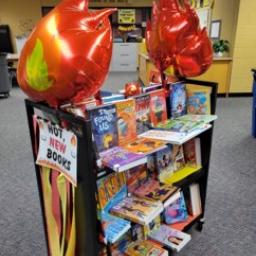 Book cart with display books and decorations